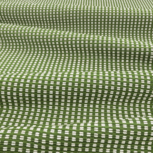 Moss-green outdoor weave with ivory broken-check marks and softly rippling texture