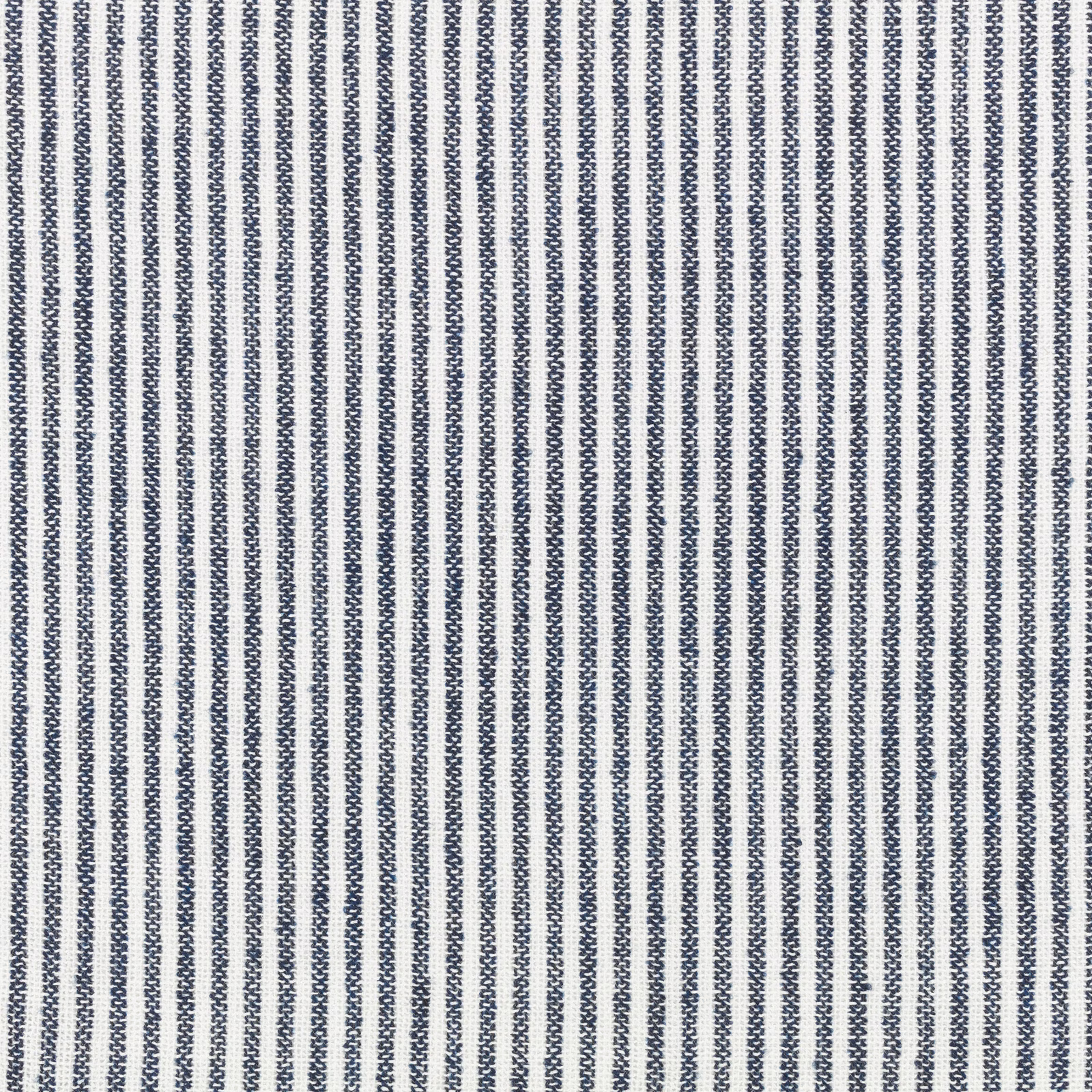 Close-up of ocean-blue zigzag lines woven in narrow vertical rows on a white ground