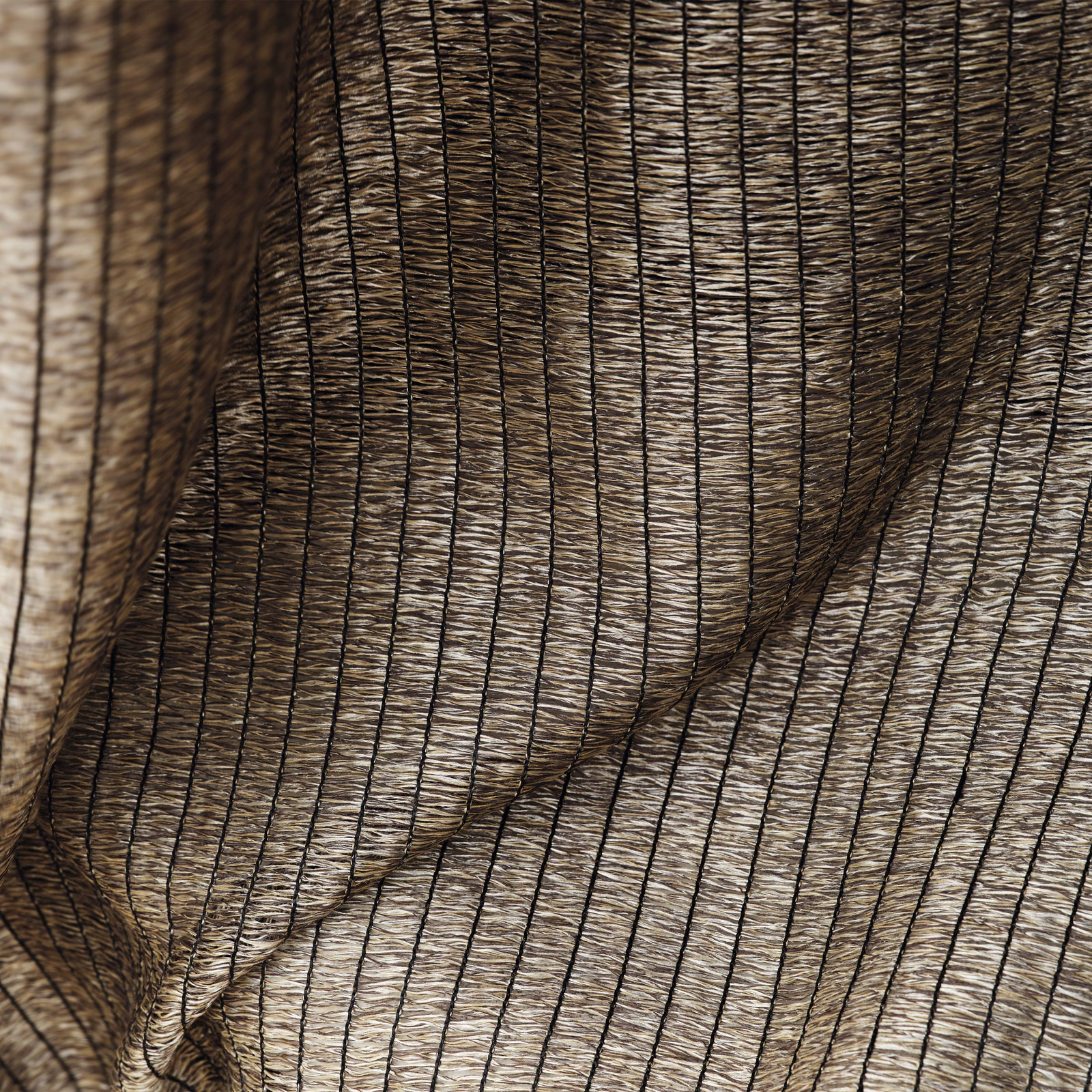 Warm gold-sand sheer with dark pinstripes and softly rippled translucent texture