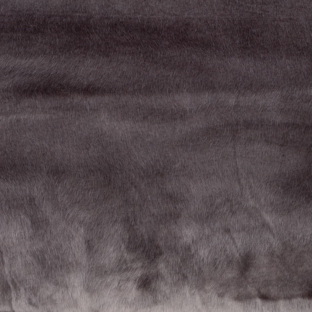 Smoky taupe plush textile with mottled horizontal bands and fur-like texture