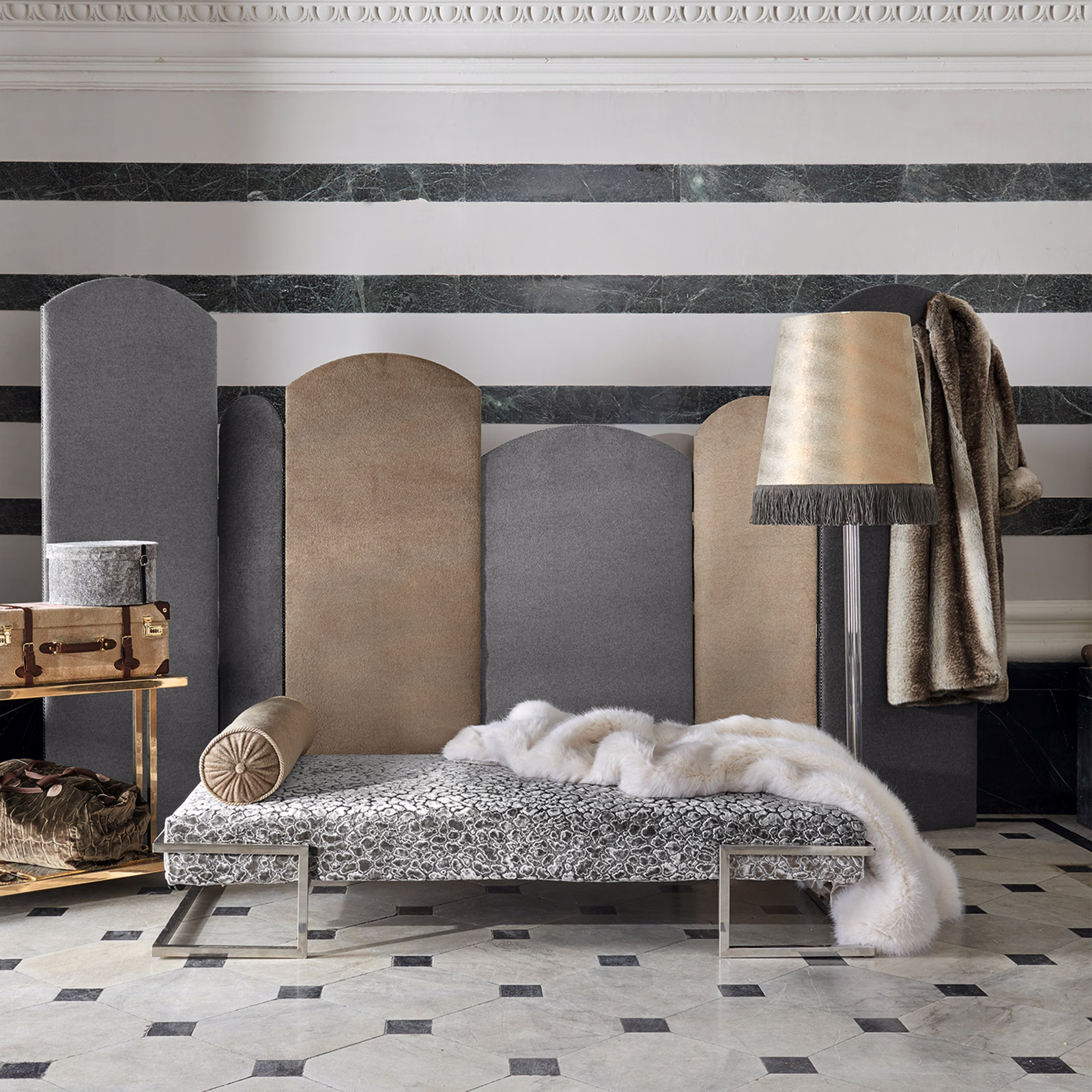 Mottled taupe-grey plush textile hanging beside a striped upholstered screen