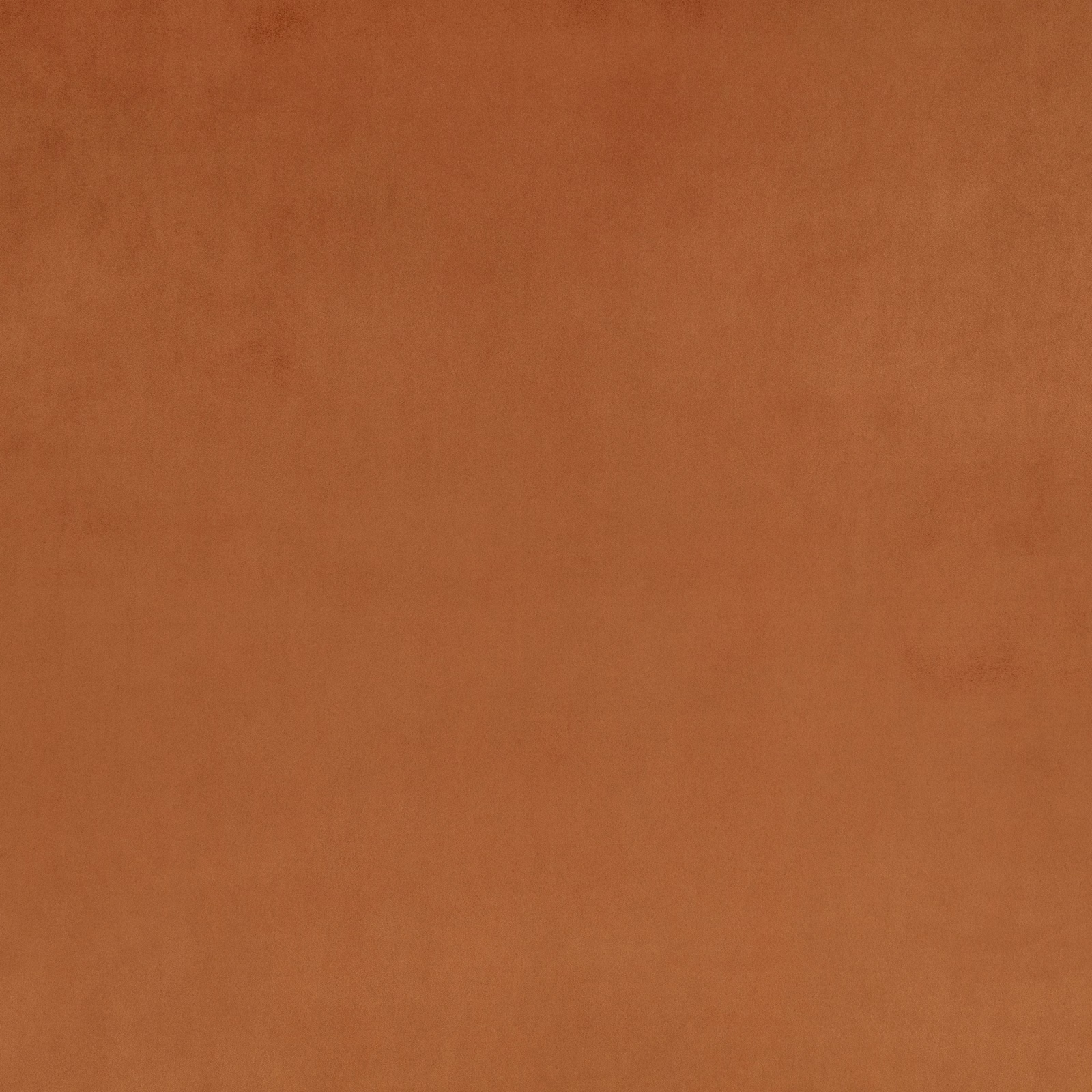Warm cognac suede-look fabric with a softly mottled, low-sheen surface
