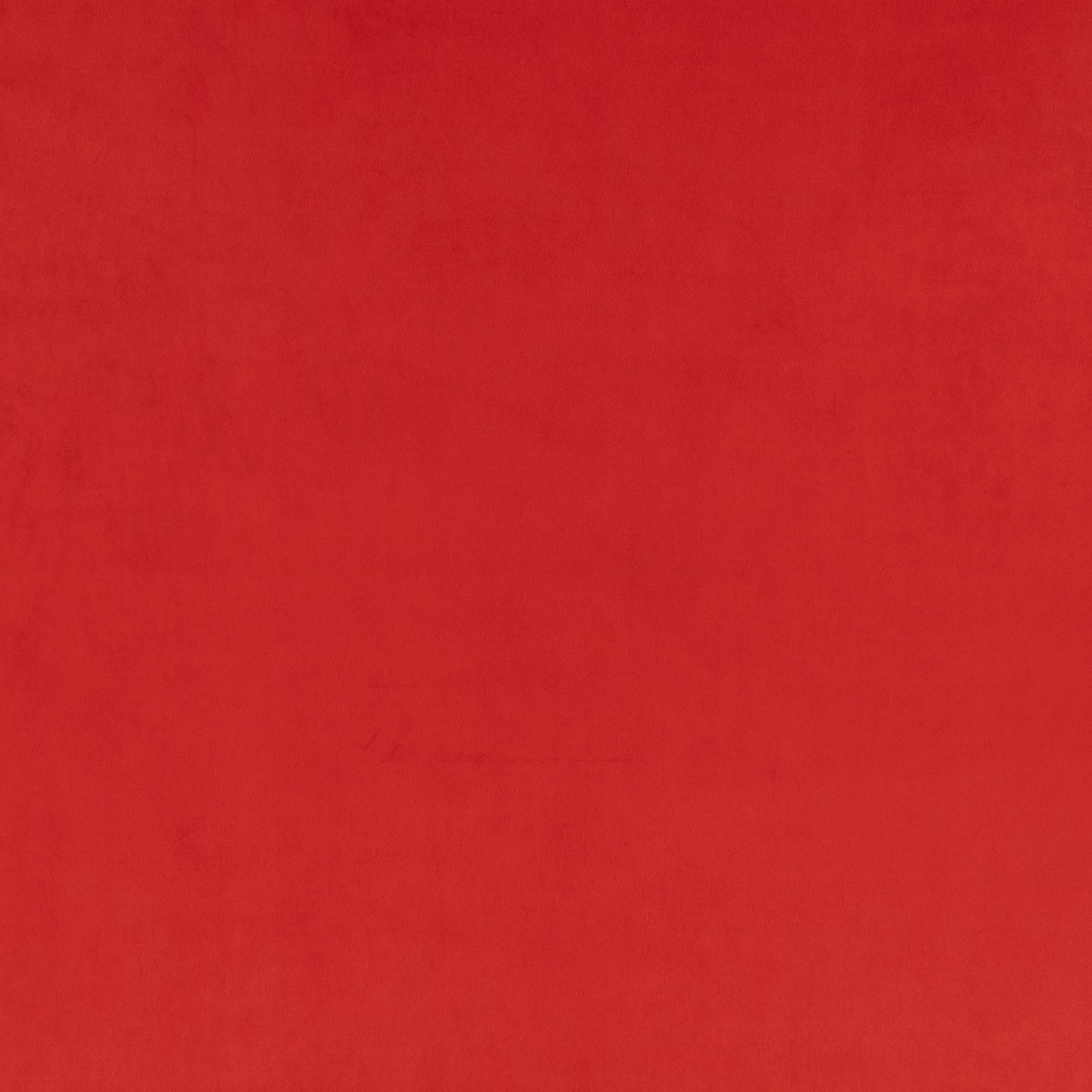 Vivid red suede-like surface with subtle nap variation across the swatch