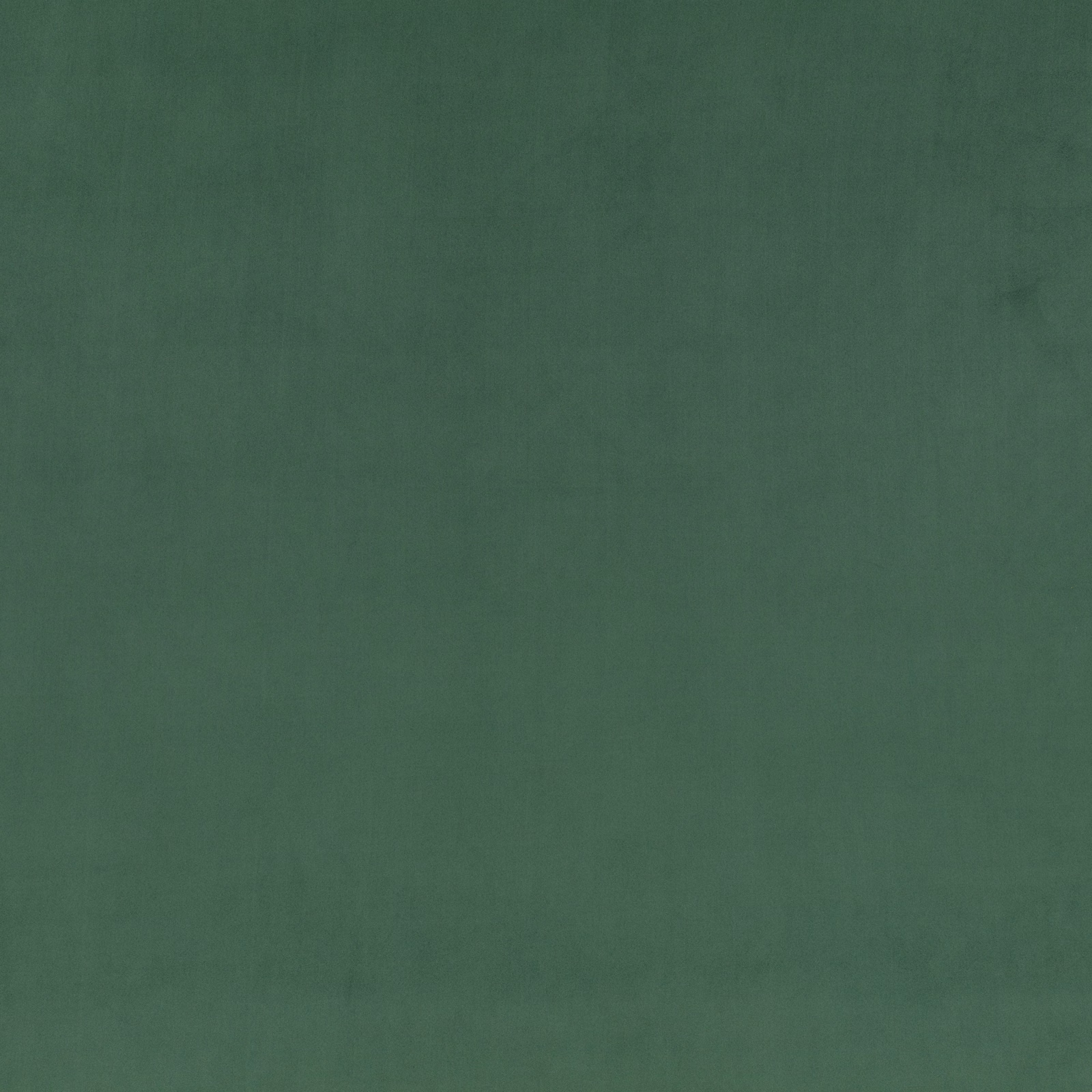 Close-up of deep hunting-green suede-like fabric with soft matte tonal variation