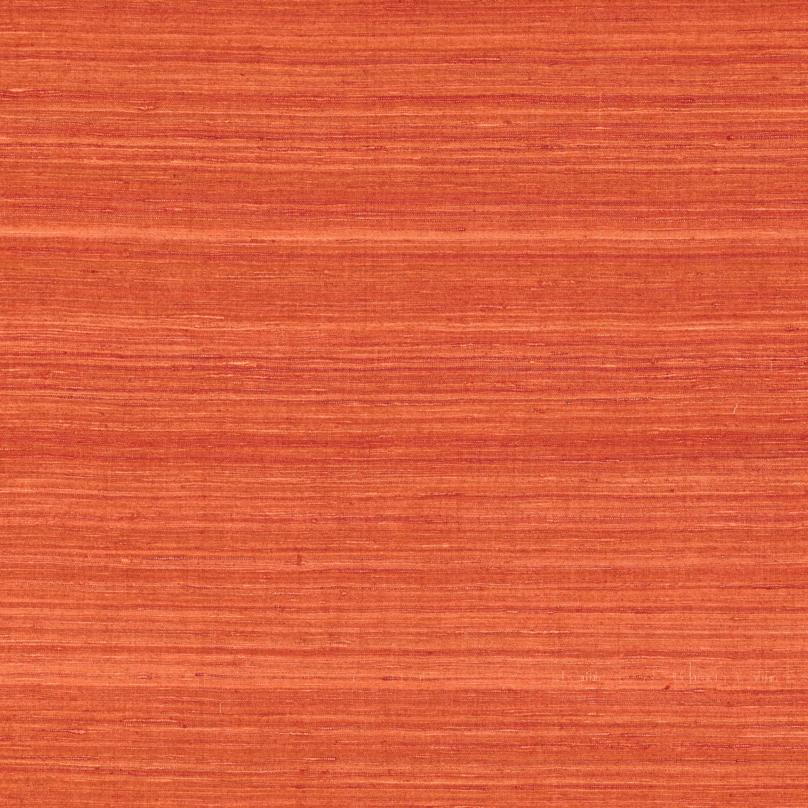 Warm terracotta-orange fabric with fine horizontal striations and subtle slub texture