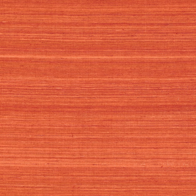 Warm terracotta-orange fabric with fine horizontal striations and subtle slub texture