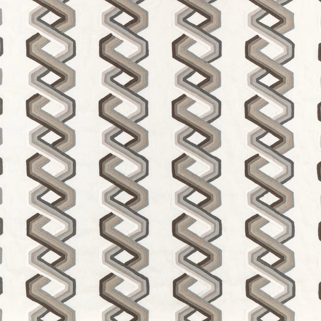 Warm ivory fabric with repeating taupe and charcoal interlocking geometric bands