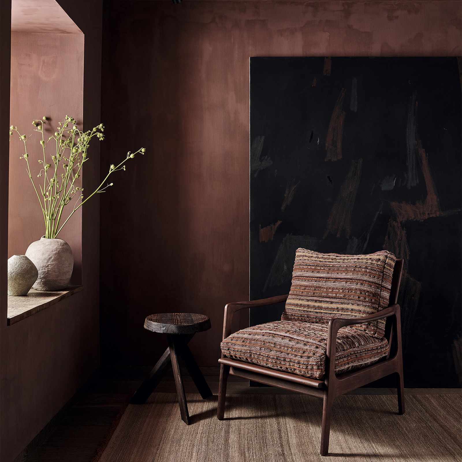 Warm cognac woven upholstery with russet horizontal stripes and a nubby textured surface