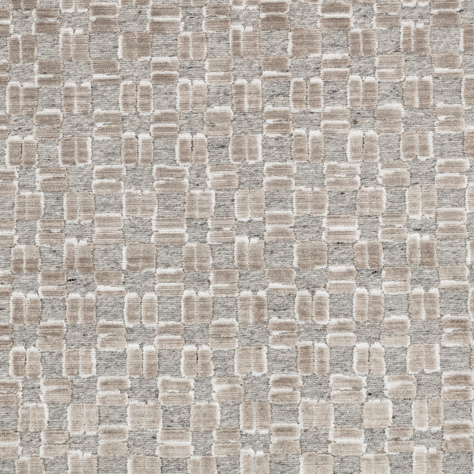 Warm taupe and chalk rectangular blocks in a softly textured natural woven swatch