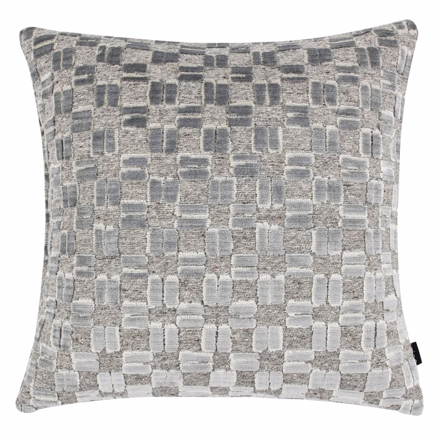 Pale seafoam-grey woven cushion with tactile rectangular blocks and charcoal-grey accents