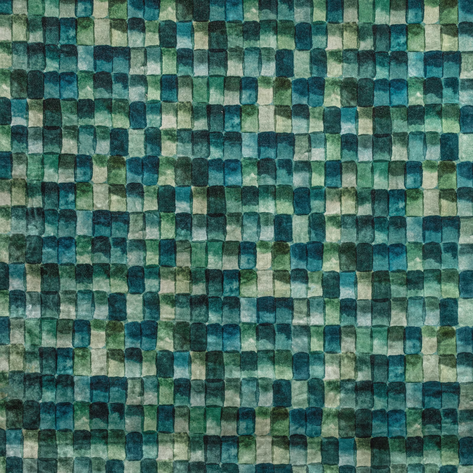 Peacock teal textile with small mottled aqua, emerald and navy mosaic blocks