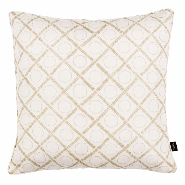 Warm cream textile with taupe diamond lattice and outlined circular motifs on a cushion