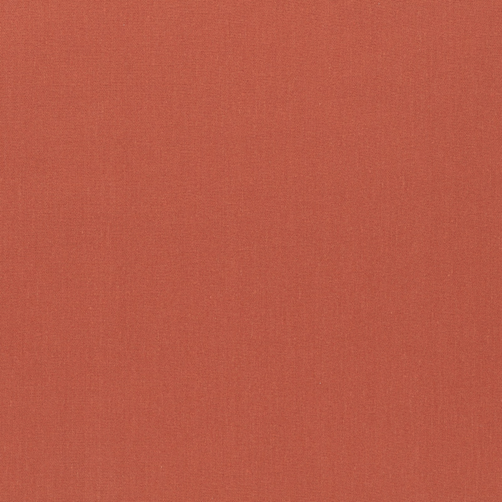 Warm brick-terracotta plain fabric with a fine, softly textured weave