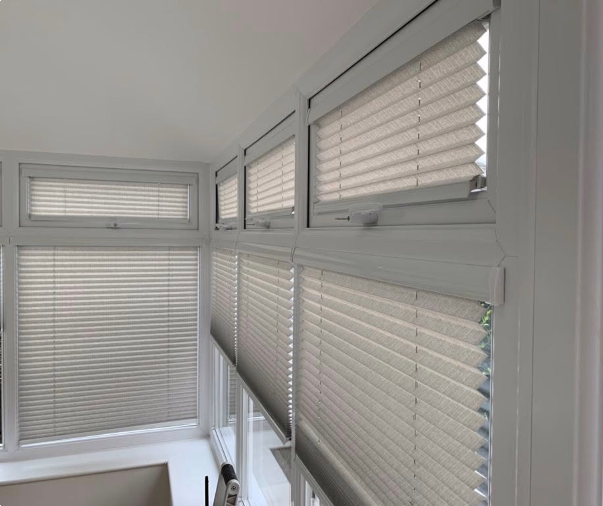 Perfect fit blinds inside the frames of a garden room