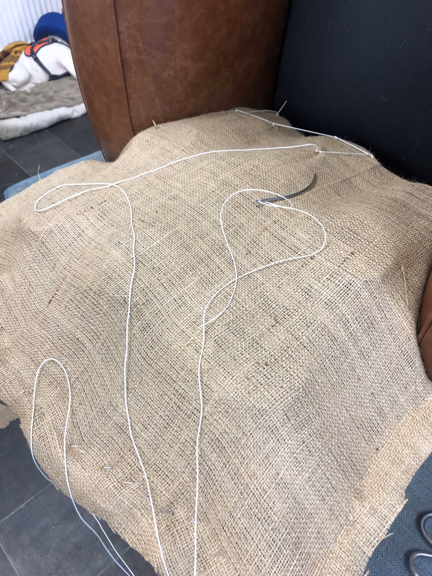 Hessian laid over the springs and stitched through