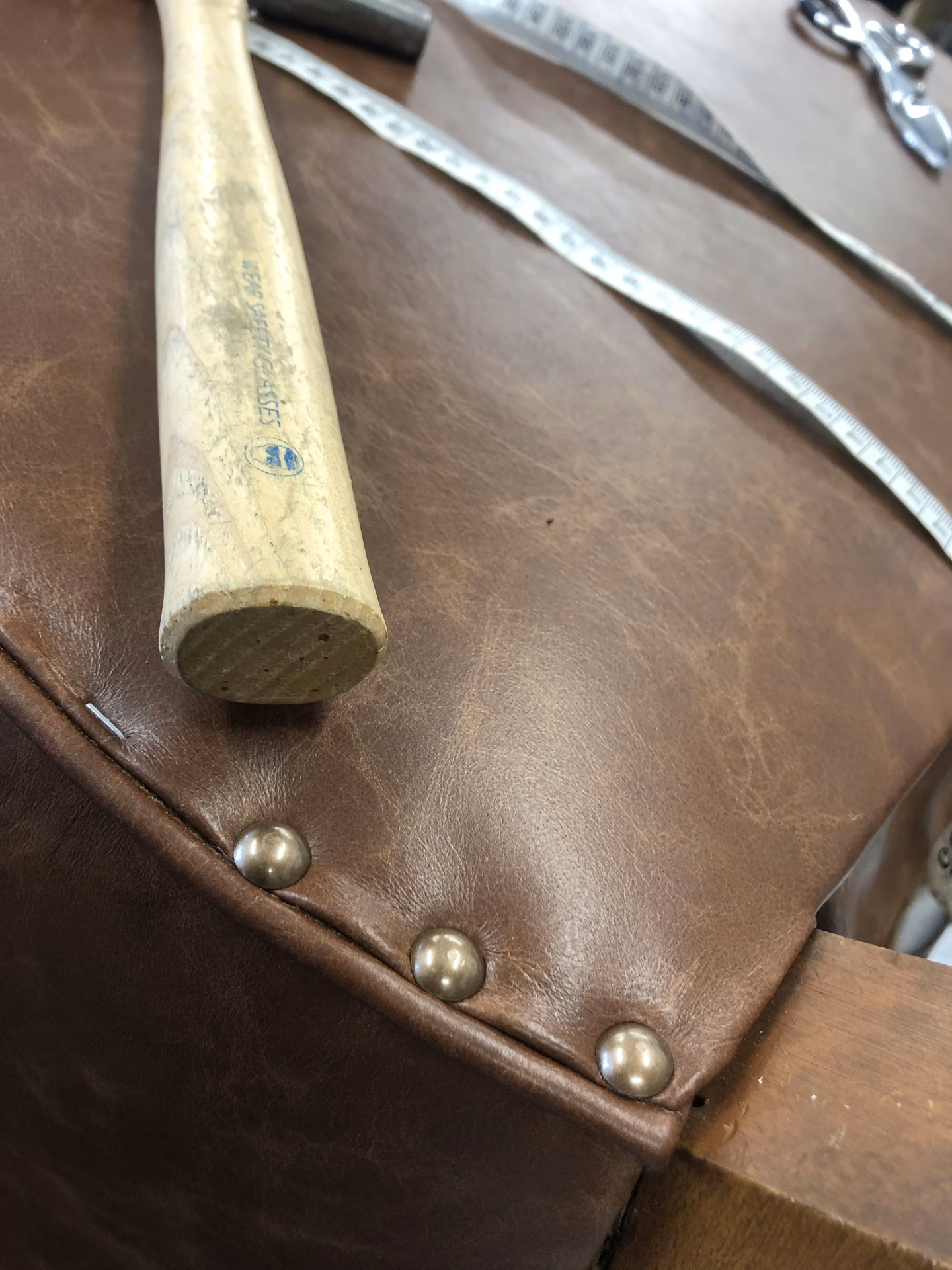 Studs spaced evenly on back by hand
