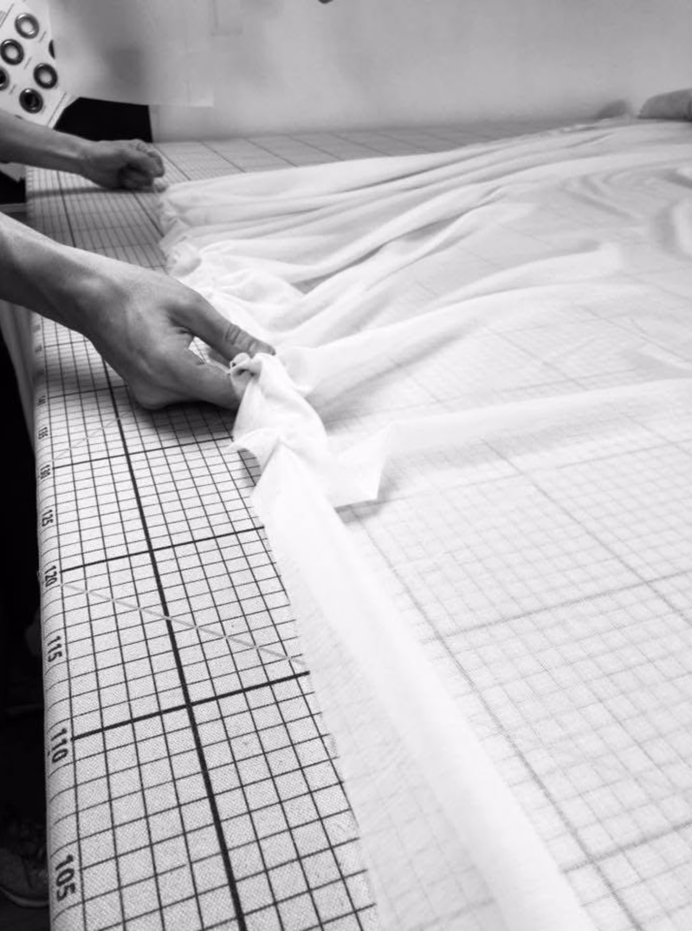 Pinning a sheer on the cutting table