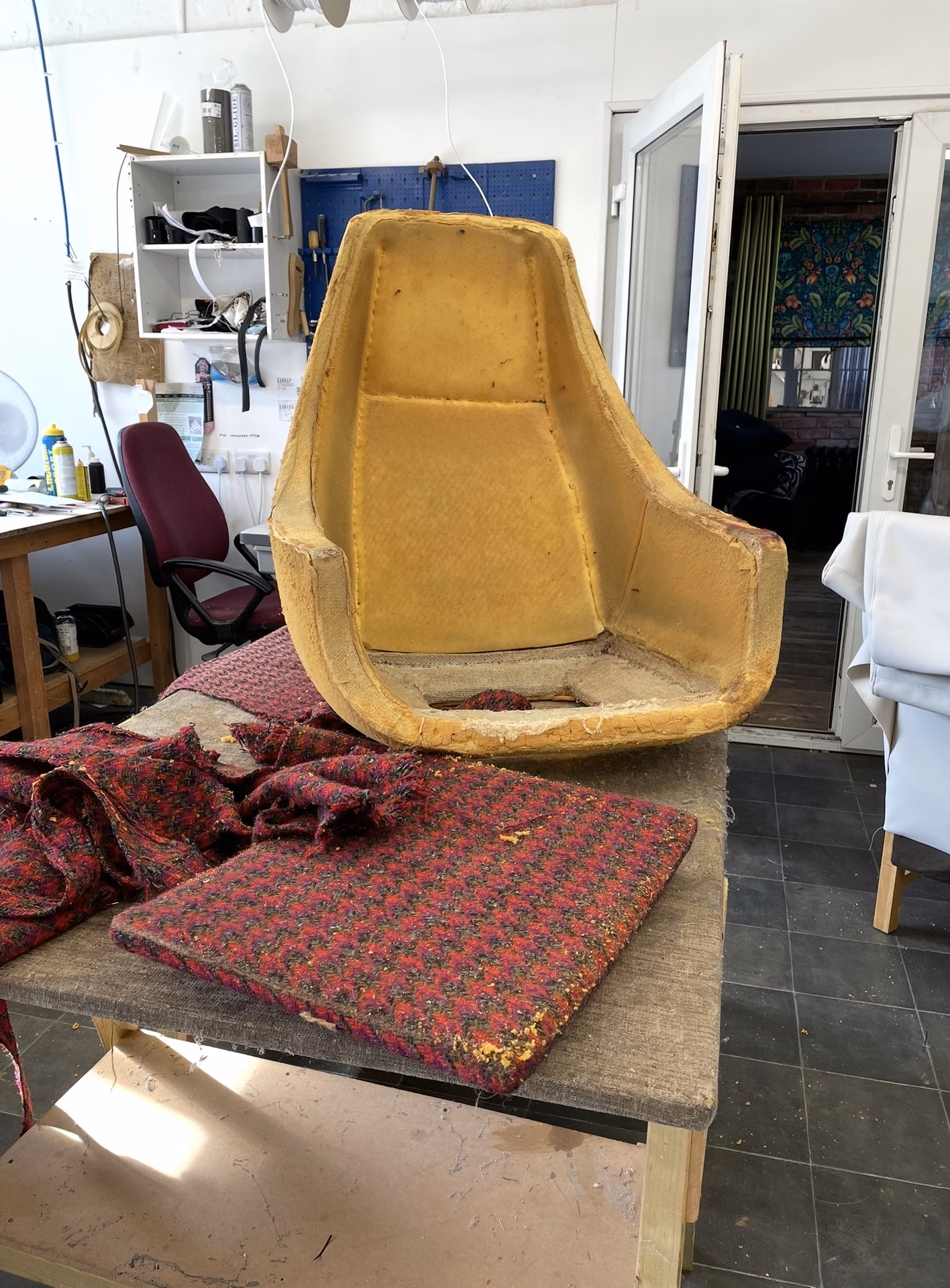 A chair stripped back to its bare frame