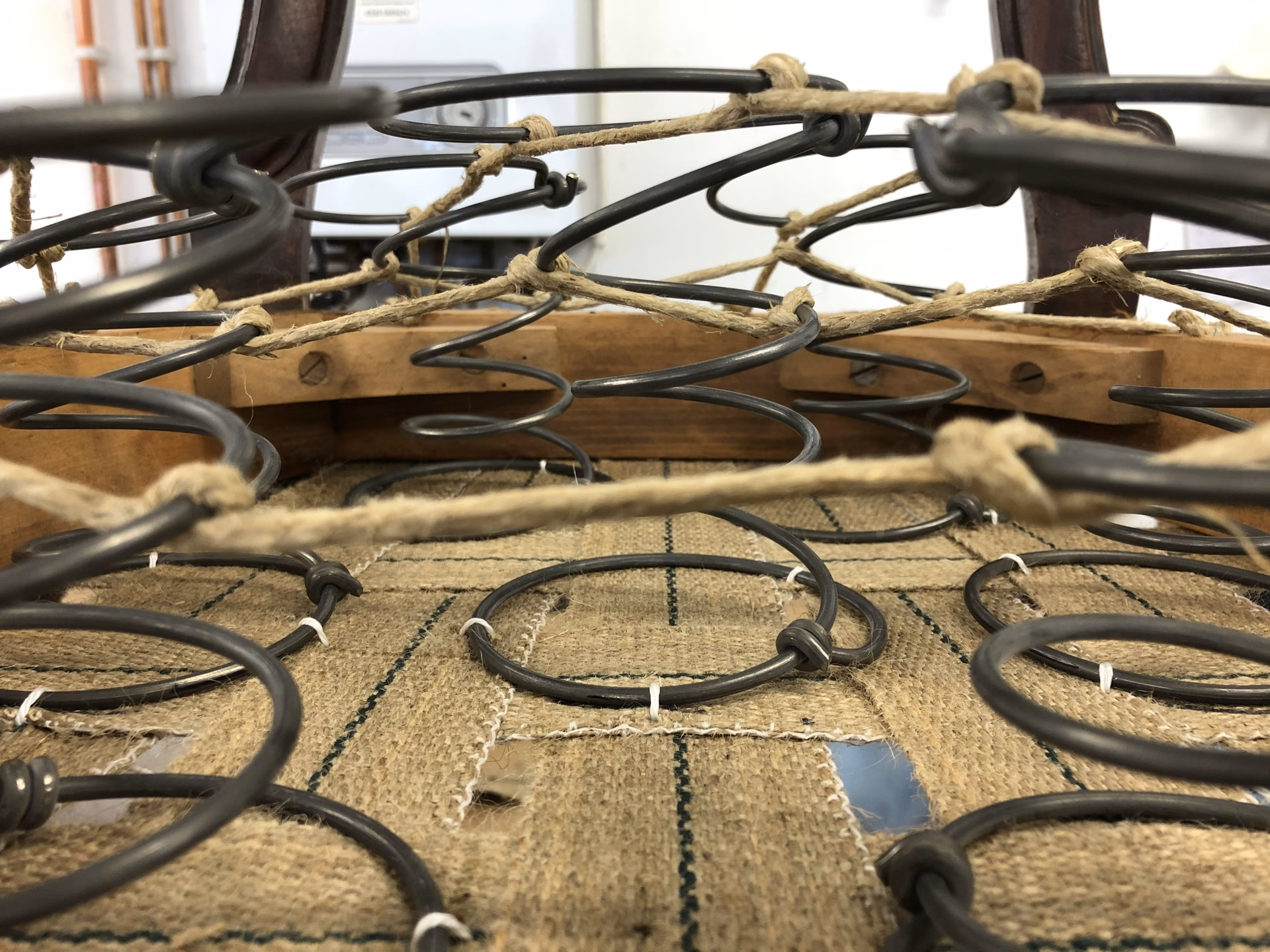 Hand-tied springs on a webbed base